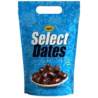 Fresh, plump dates arranged in a wooden bowl.