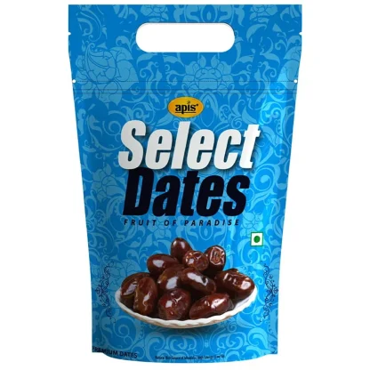 Fresh, plump dates arranged in a wooden bowl.