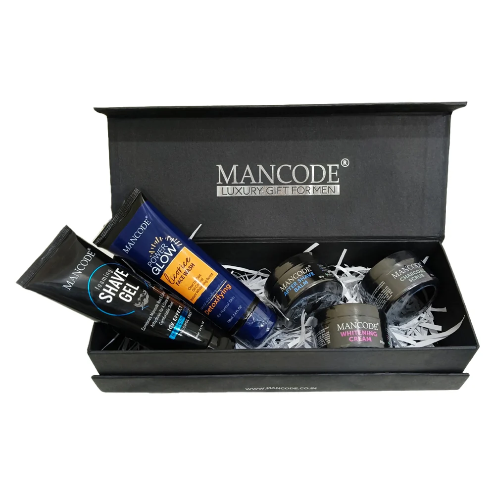 Men’s grooming products including shaving tools, skincare, hair styling items, and deodorants arranged neatly on a bathroom counter.